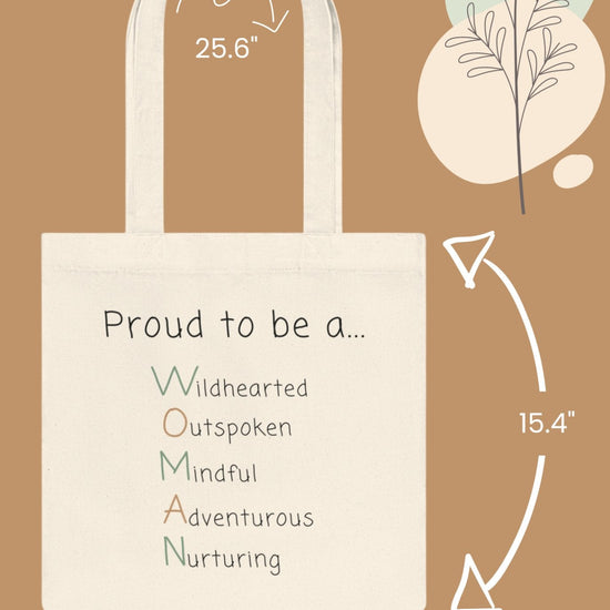 Meet the eco-friendly Adventurous Woman Tote Bag, ideal for sustainable travel. This canvas accessory boasts pastel plant designs against a brown base. It measures 25.6 inches in height, 15.4 inches in width, and 14.6 inches in depth, with the inspiring phrase "Proud to be a... WOMAN" emblazoned on it.